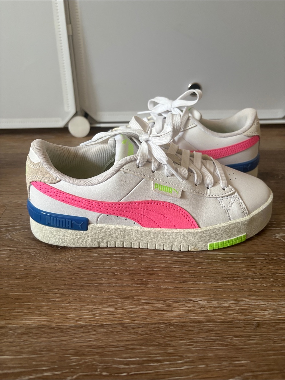 Puma Kids White Sneakers with Pink Stripe and Blue & Lime Accents